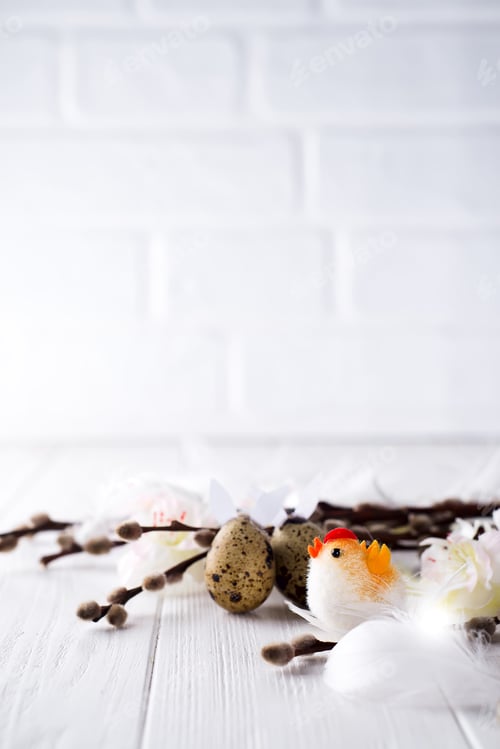 Preview: Easter quail eggs with hare ears and willow branch