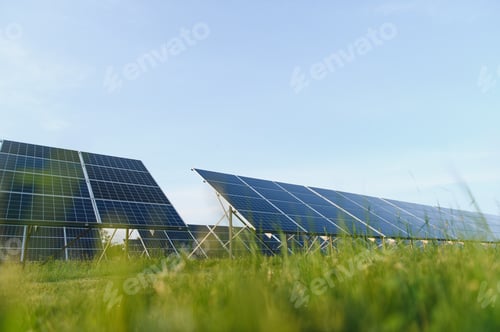 Preview: Solar panels energy farm on sky background.