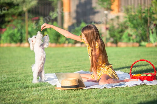 Preview: Two little kids on picnic in the park