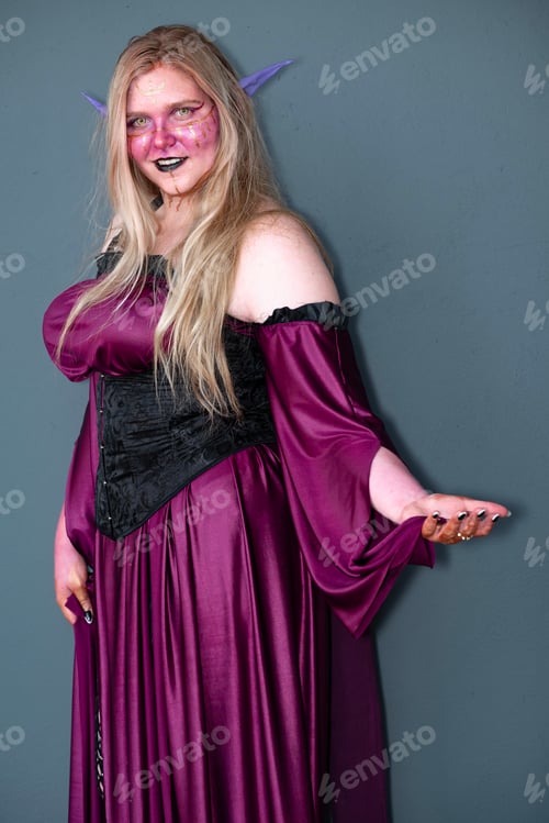 Preview: Female cosplayer in a fantasy witch costume