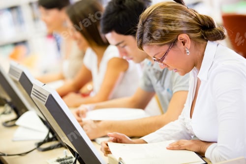Preview: Group Of Students Studying In A Computer Room