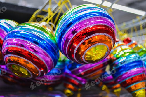 Preview: Bright glass rainbow colored Christmas balls, baubles hanging for sale