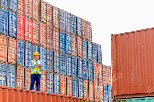 Preview: male engineers in a container shipping company Consulting