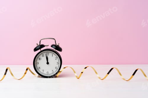 Preview: Christmas and New Year countdown concept with alarm clock