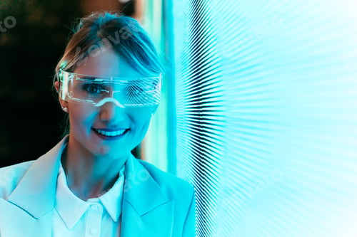 Preview: business woman with cyborg bionic arm and augmented reality visor.