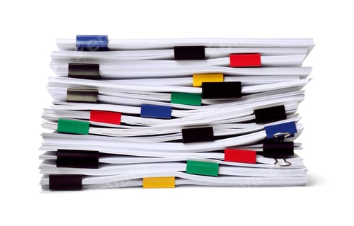 Preview: Colorful binder clips with sheets of paper isolated on white