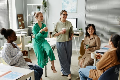 Preview: Business colleagues having a meeting at office
