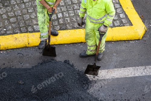 Preview: Workers take a break during asphalt road work