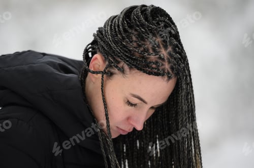 Preview: Young woman with African braids
