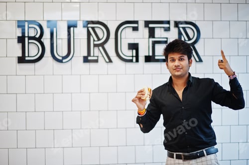 Preview: Indian man at fast food cafe