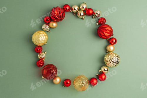Preview: Festive Christmas Ornament Wreath on Green Background