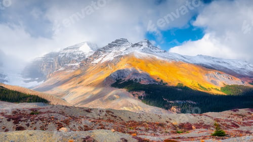 Preview: Mountains with high rocks and snow on the tops. Alberta, Canada.
