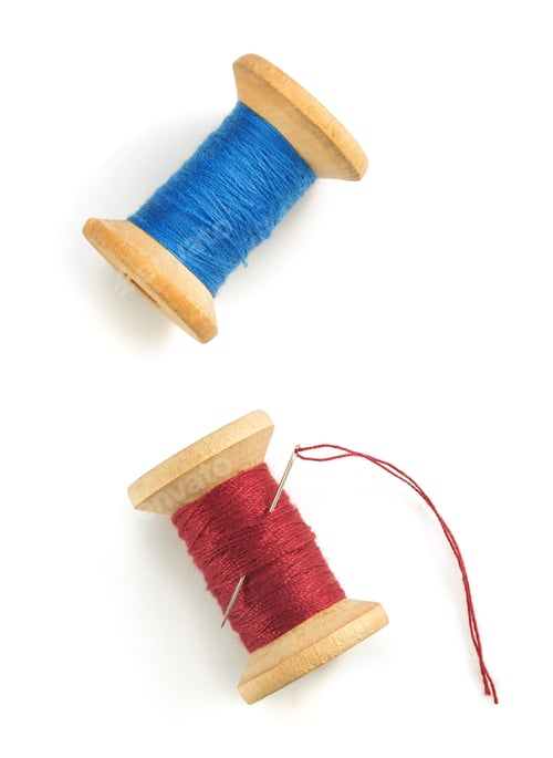 Preview: spool of thread on white background