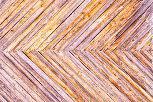 Preview: The background is made of narrow wooden planks at an angle to each other.
