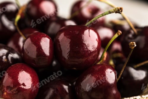 Preview: Fresh Cherries Closeup with Stems and Reflections