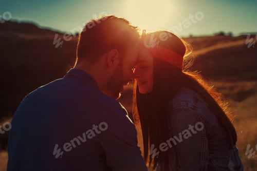 Preview: Young loving couple enjoys the sunset
