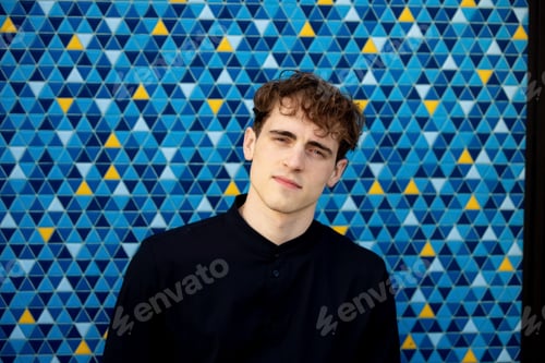Preview: handsome men portrait. Coloured background. Young