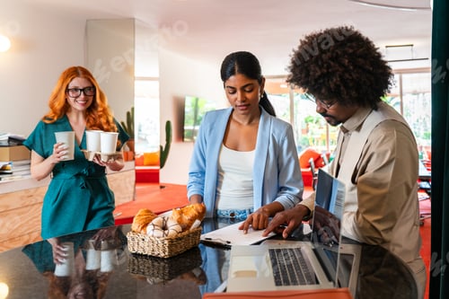 Preview: Multiethnic small group of businesspeople meeting in a coworking company office