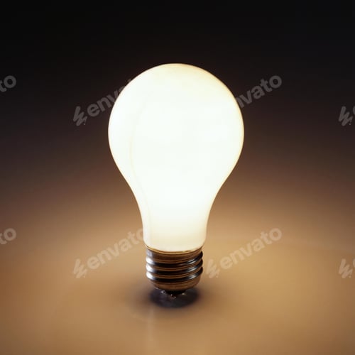 Preview: Illuminated Lightbulb Against a Dark Background