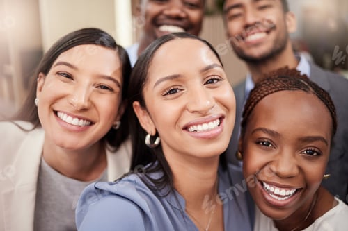 Preview: Together our team only gets better. Shot of a team of businesspeople taking a selfie together.