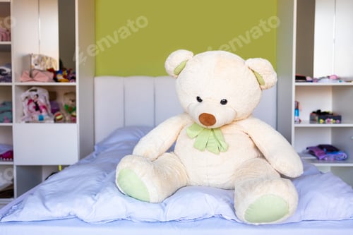Preview: Natural, bright kid's bedroom interior with wooden furniture, designer accessories and toys.