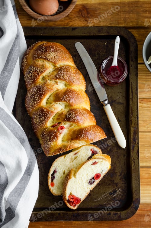 Preview: Easter bread with raisins, dried cherries, jam and butter. Cozonac - Bulgarian Easter bread