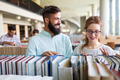 Preview: Students studying in library. Young success people are spending time together and learning together