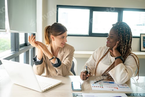 Preview: Business discussions. Shot of business people brainstorming in an office.