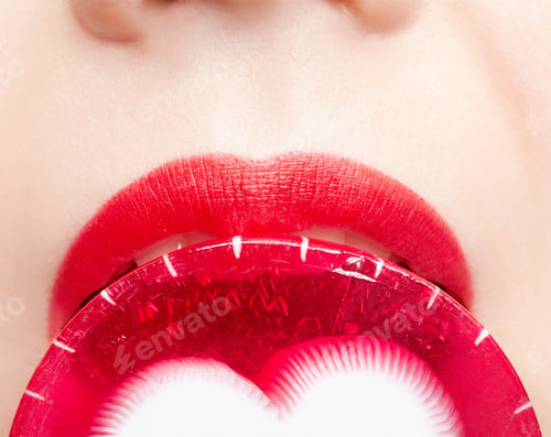Preview: Face Part Portrait Of Beautiful Young Woman Tasting Red Lollipop With White Heart In The Middle