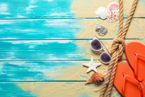 Preview: flip flops on blue wooden floor.