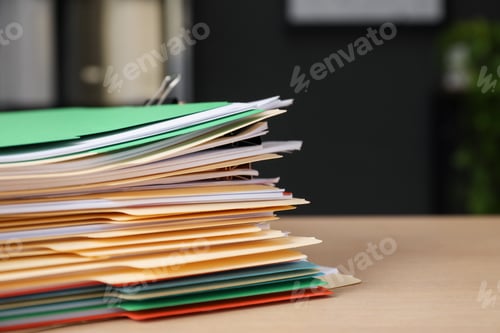 Preview: Many folders with documents on wooden desk, closeup. Space for text