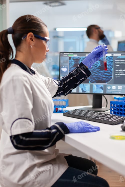 Preview: Medical researcher analyzing blood in test tube
