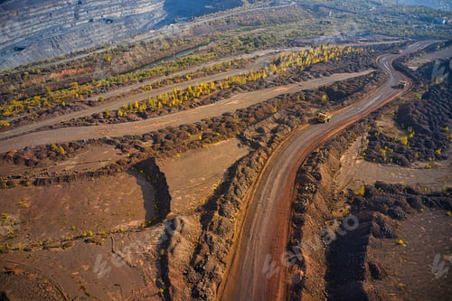 Preview: Huge mounds of waste iron ore near the quarry