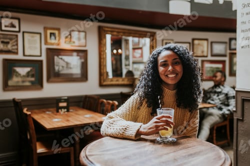 Preview: Woman sitting at a pub