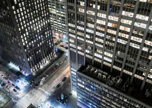 Preview: Elevated view of street at night, skyscraper in foreground, New York City, New York, USA
