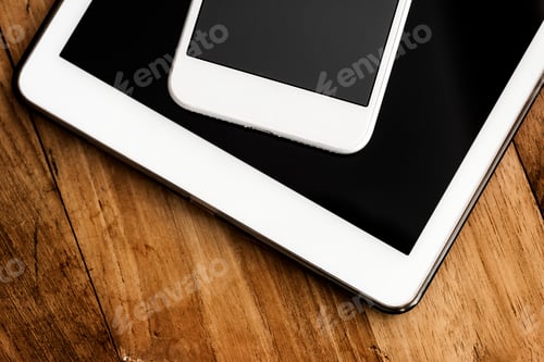 Preview: Closeup of mobile phone with earphones