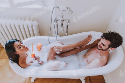 Preview: Couple in love spending time together in the house. Romantic moments in the bathroom