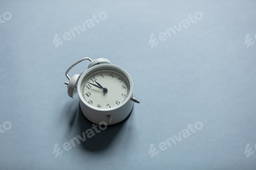 Preview: Vintage alarm clock on gray background, Depression concept