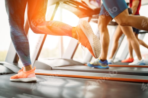 Preview: Picture of people running on treadmill in gym