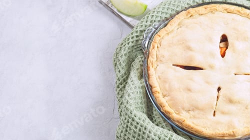 Preview: Sweet potato and apple cobbler in glass baking dish, horizontal top view copy space