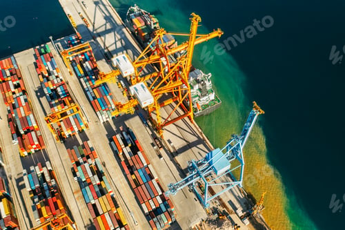 Preview: Containers in international shipping dock waiting to import or export and transportation. Top view