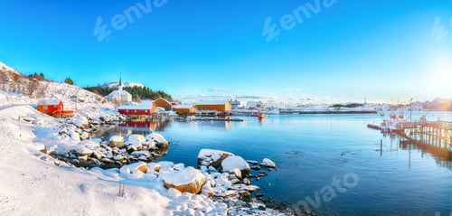 Preview: Stunning winter scenery of Moskenes village with ferryport and famous Moskenes parish Churc