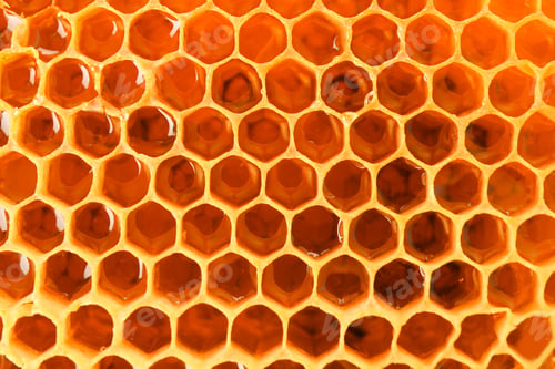 Preview: Filled honeycomb as background. Healthy natural sweetener