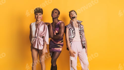 Preview: Trans men posing while smiling at the camera in a photographic studio