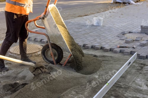 Preview: Road construction works with preparation of the surface to establish sidewalk bricks of sandy sand