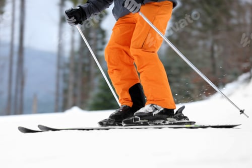 Preview: Skier on slope at resort, closeup. Winter vacation