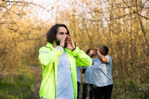 Preview: Rescue party captain leading people through the forest to track steps