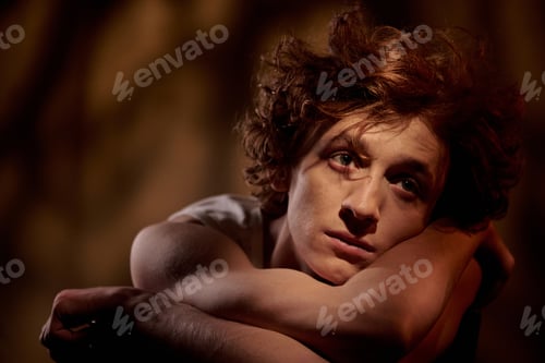 Preview: Alone Man Lying on Hands