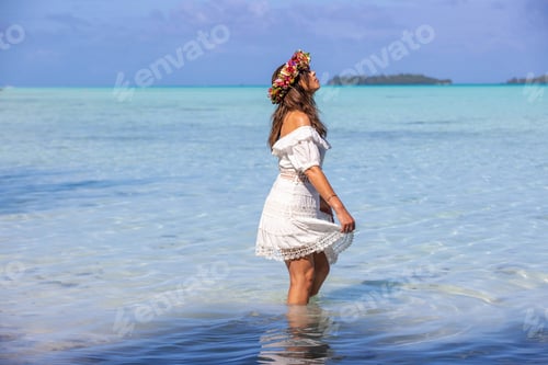 Preview: Woman in blue tropical island ocean water