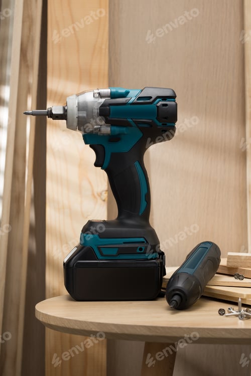 Preview: Cordless Impact Driver on Wooden Table Close Up